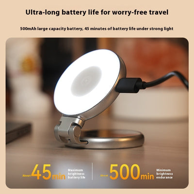 Magnetic beauty fill light  with text about battery life on a blurred background