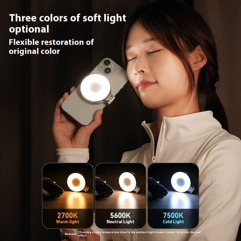 Person using a phone with a light attachment, showing different color temperatures of the starvelle luxmirror Magnetic beauty fill light  on a dark background